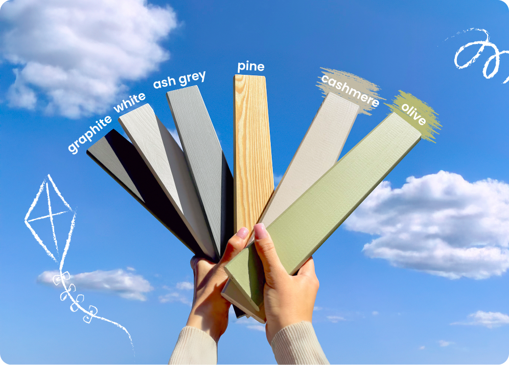 Seven colour samples held in two hands against a cloudy sky. Each sample represents a different shade and is labelled (from left to right): 'graphite', 'white', 'grey', 'pine', 'cashmere' and 'olive'.
