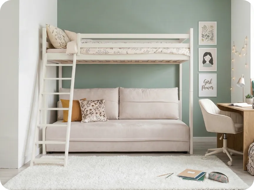 Cotton children's loft bed with a sofa underneath in a youth room with sage tones