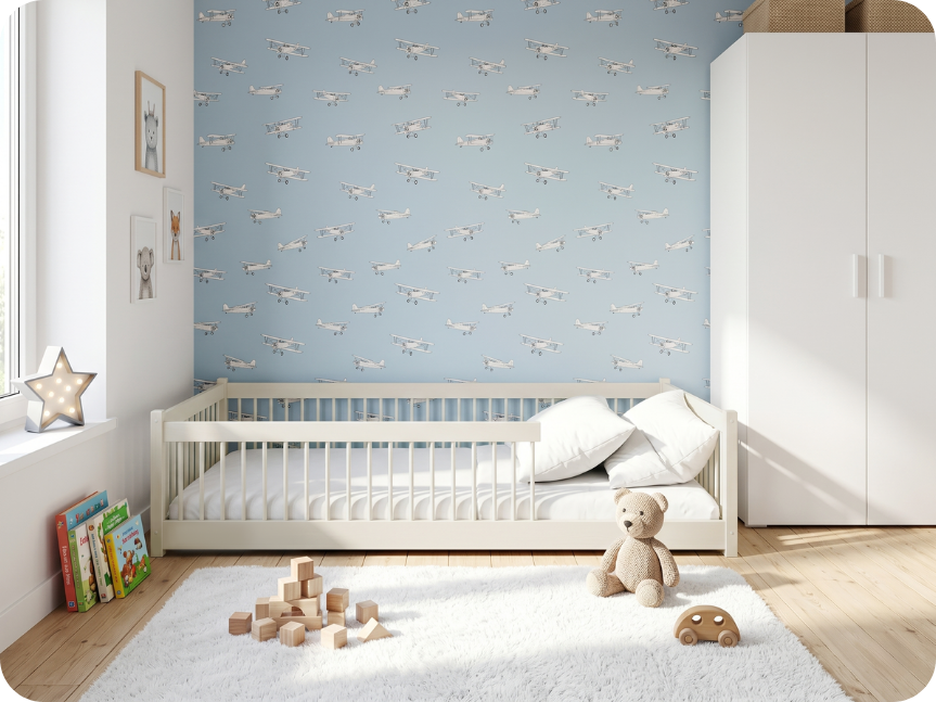 Single floor bed in cotton color with slats, in a children's room with blue airplane wallpaper
